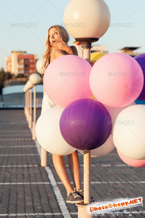 PhotoDune Happy young woman with colorful latex balloons 6308990