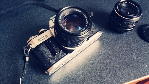 CreativeMarket - Vintage Camera with Lens 76420