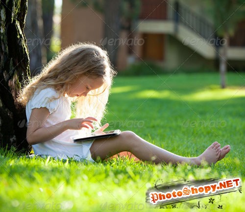 PhotoDune Child with tablet pc outdoors 6694402